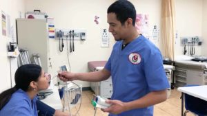 medical assistant students in exam room