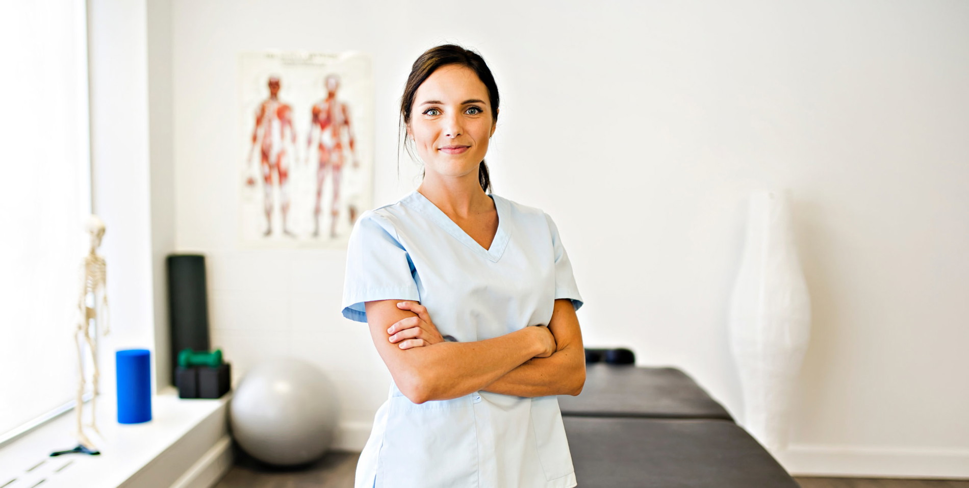 A caucasion female massage therapy professional